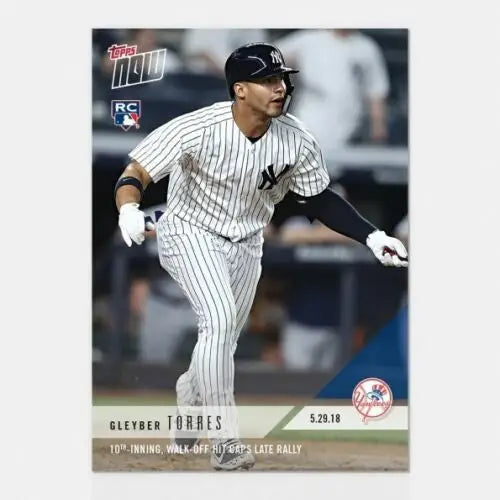 Baseball card of Gleyber Torres in batting stance for hit caps late rally