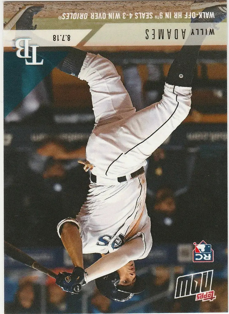 Baseball player in white uniform mid-pitch on trading card for 9th seals win over Orioles Williy Adames