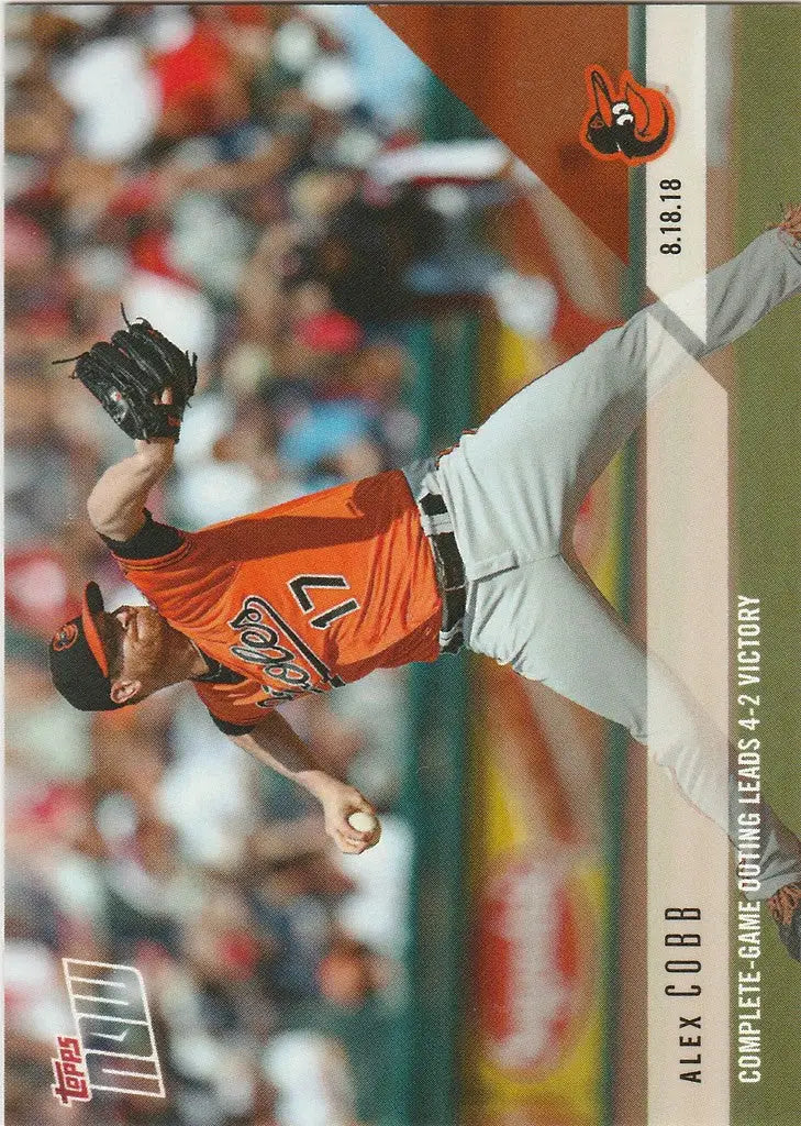 Baseball player in orange jersey pitching during complete game outing Alex Cobb