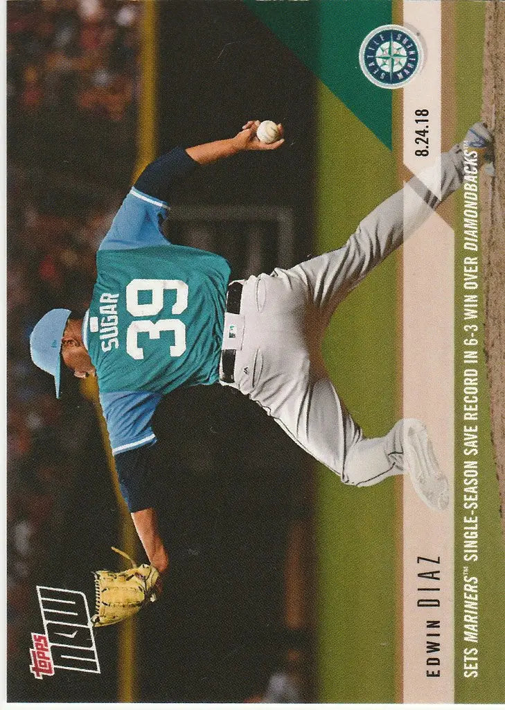 Baseball player in teal jersey pitching ball for Edwin Diaz Sets Mariners single season save record