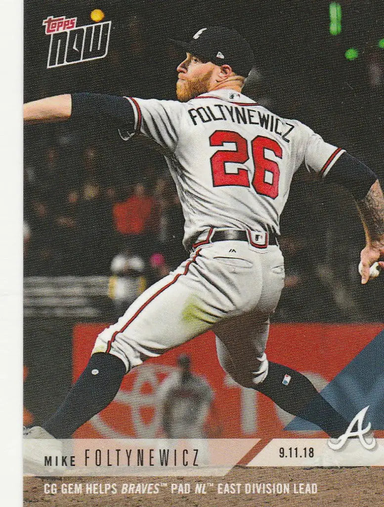 Baseball player Mike Foltynewicz in Atlanta Braves uniform helping NL East lead
