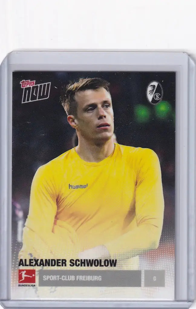 Soccer trading card of Alexander Schwalow in bright yellow jersey for Sport-Club Freiburg