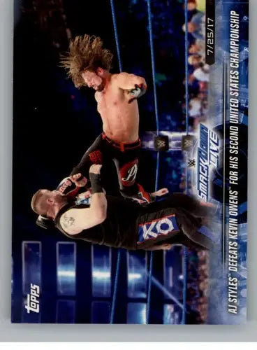 WWE Topps trading card featuring AJ Styles defeating Kevin Owens from 2018 Topps Road to WrestleMania