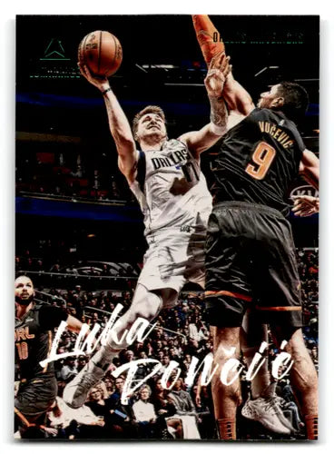 Basketball trading card featuring Luka Dončić in action from Panini Chronicles Luminance Green