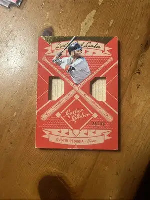 Dustin Pedroia baseball card featuring Leather Dustin Pedroia dual relic from 2019 Panini Lumber And Leather