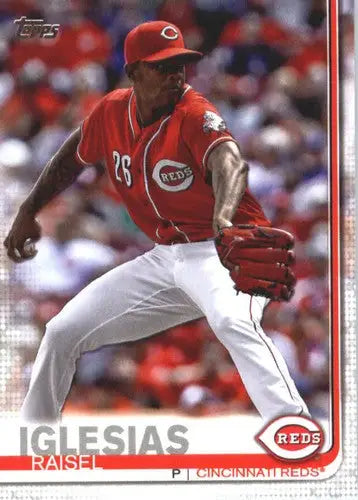 Original gloss baseball card of Raisel Iglesias NM-MT from 2019 Topps #465 Reds