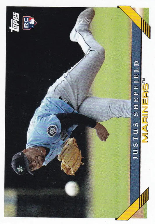 Baseball player in light blue diving to catch a ball from Topps Archives Justus Sheffield