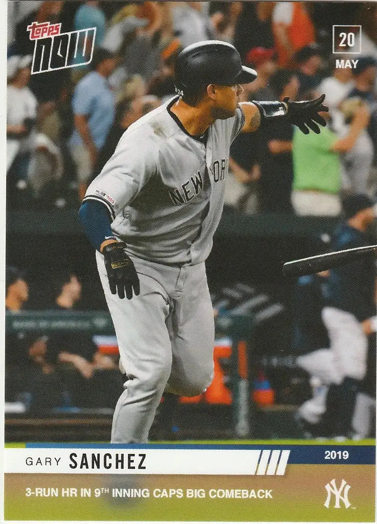 Baseball player in New York Yankees uniform swinging bat during 9th caps comeback
