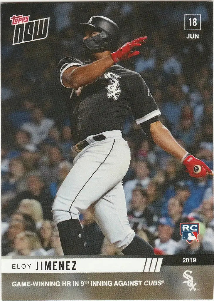 Baseball player swinging bat in Chicago White Sox uniform for Eloy Jimenez game winning HR