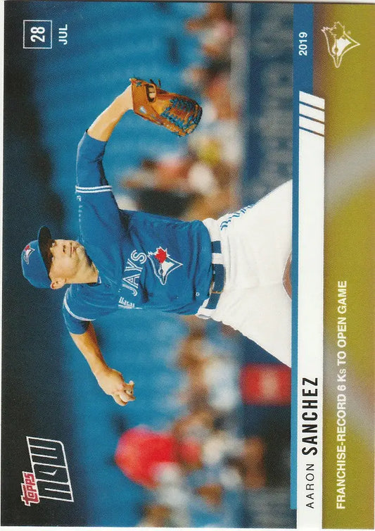 Baseball player in blue Toronto Blue Jays uniform pitching during start game Toronto