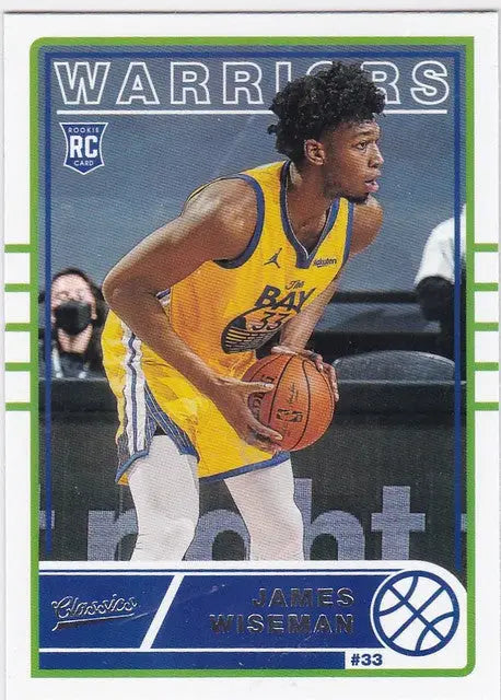Basketball trading card of James Wiseman in Warriors jersey holding a basketball