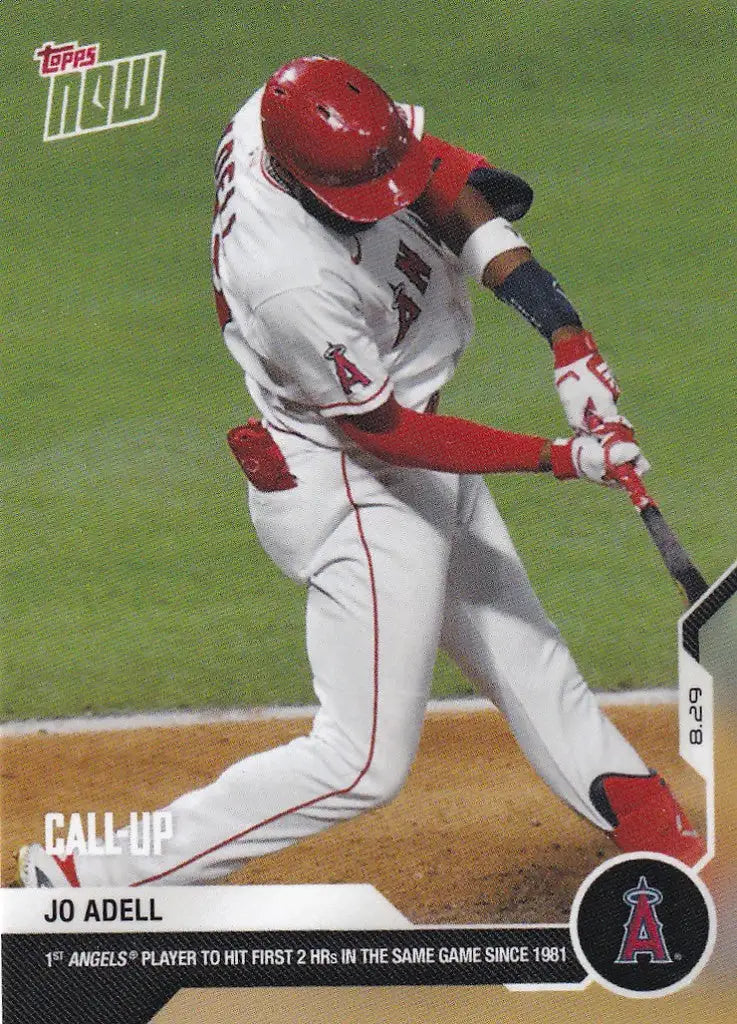 Baseball player in white and red uniform swinging bat for Adell Los Angeles card