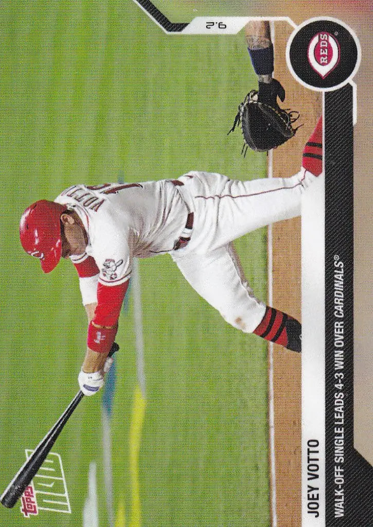 Baseball player Joey Votto in white uniform swinging bat for Cincinnati Reds collectible