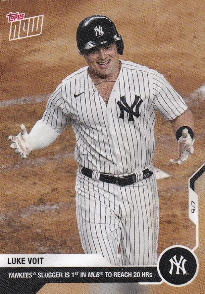 Luke Voit celebrating in New York Yankees pinstripes for trading cards collection