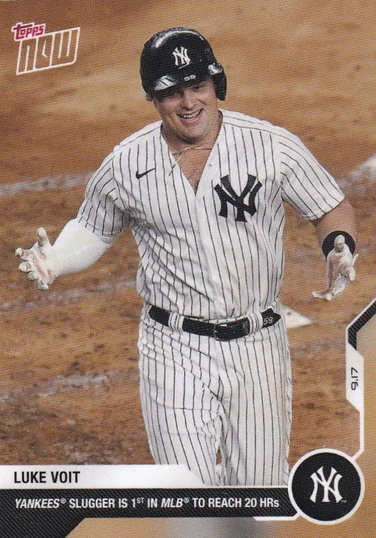 Luke Voit celebrating in New York Yankees pinstripes for trading cards collection