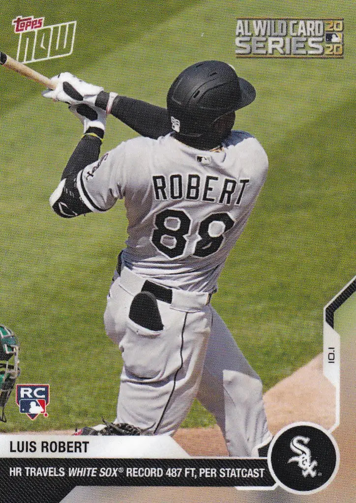 Baseball player in gray uniform swinging bat, featuring Luis Robert Chicago White Sox