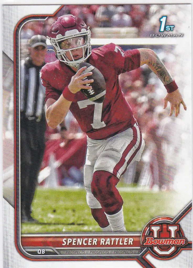 Football player in crimson jersey running with ball for Spencer Rattler South Carolina