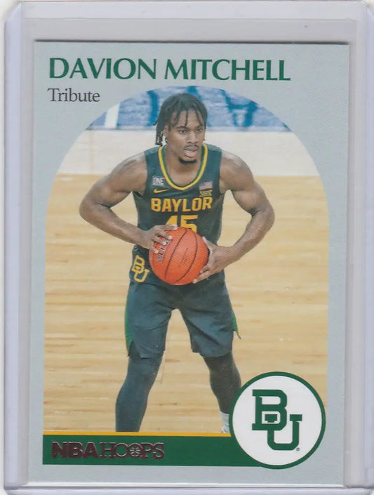 Basketball trading card of Davion Mitchell Baylor in green jersey holding a basketball