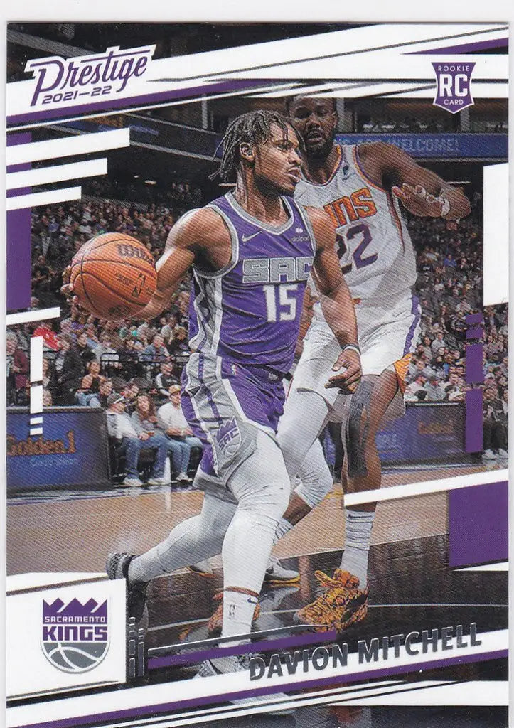 Basketball trading card of Davion Mitchell RC showcasing Sacramento Kings action