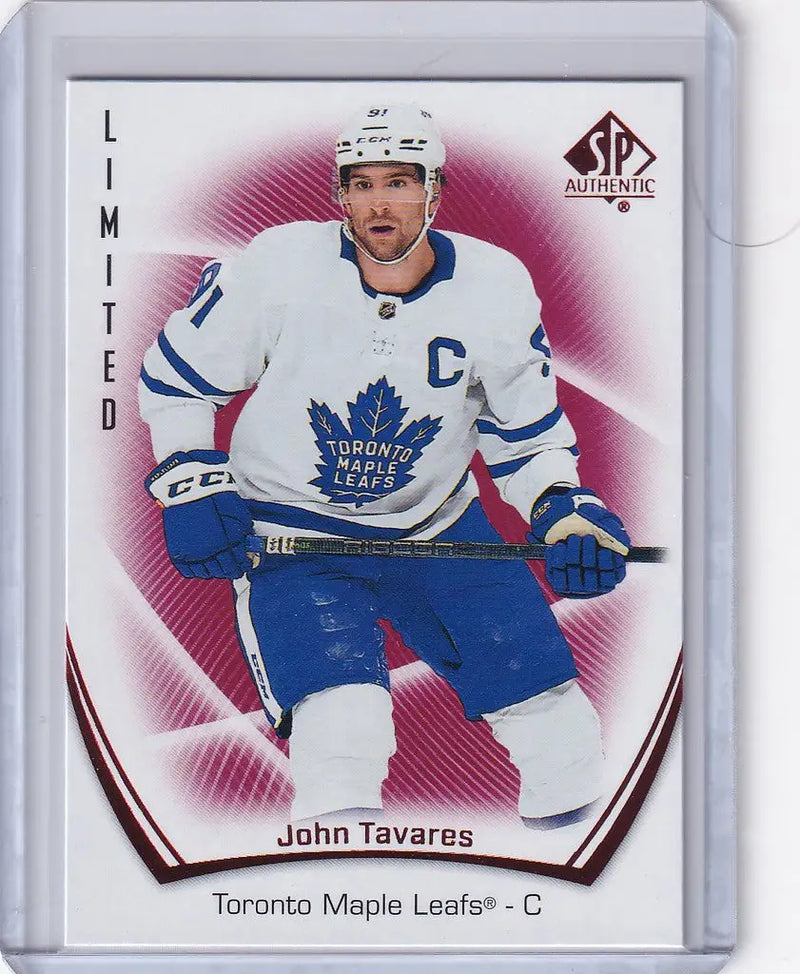 Hockey trading card of John Tavares in Toronto Maple Leafs white and blue jersey
