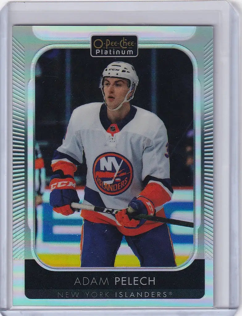 Hockey trading card of Adam Pelech from 2021-22 Upper Deck OPC Platinum Rainbow set
