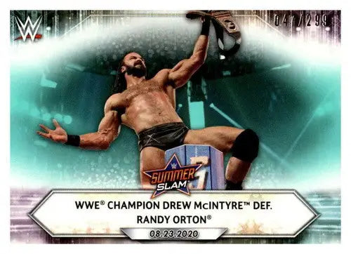 Original gloss wrestling card of Drew McIntyre holding championship belt from Topps Aqua