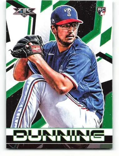 Baseball card of dane dunning pitcher in blue and white uniform with original gloss