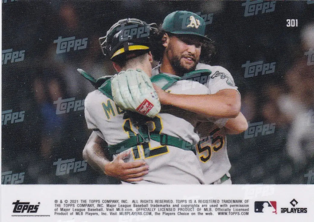 Baseball card of Sean Manaea embracing teammate from Oakland Athletics 2021 TOPPS NOW