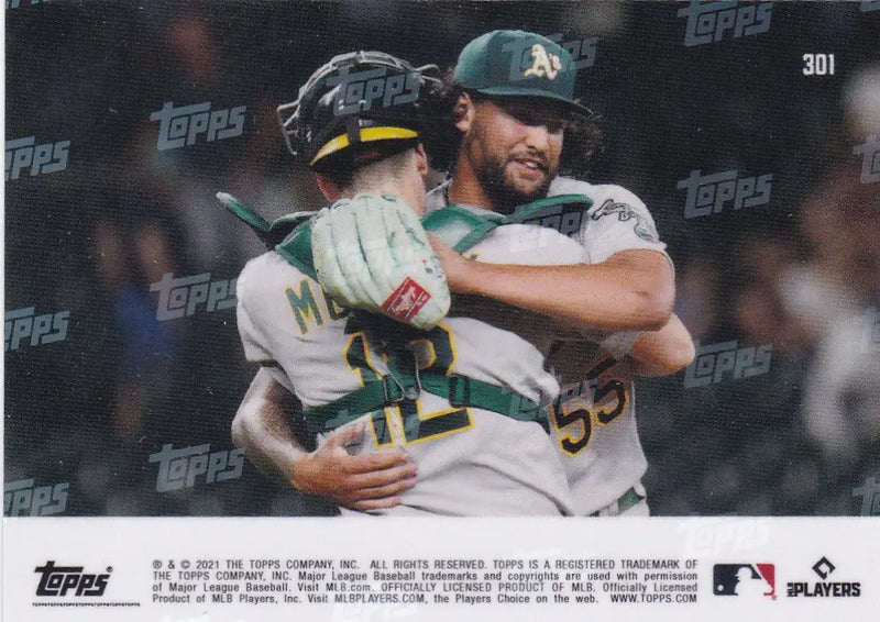 Baseball card of Sean Manaea embracing teammate from Oakland Athletics 2021 TOPPS NOW