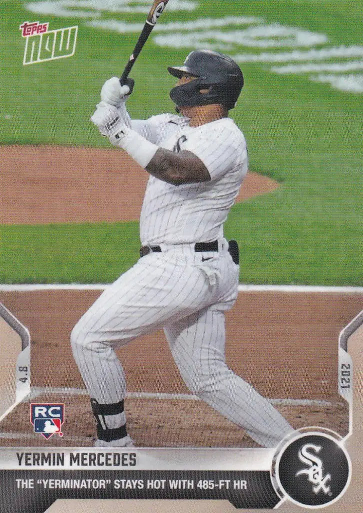 Baseball player in white uniform swinging bat for Yermin Mercedes Chicago White Sox