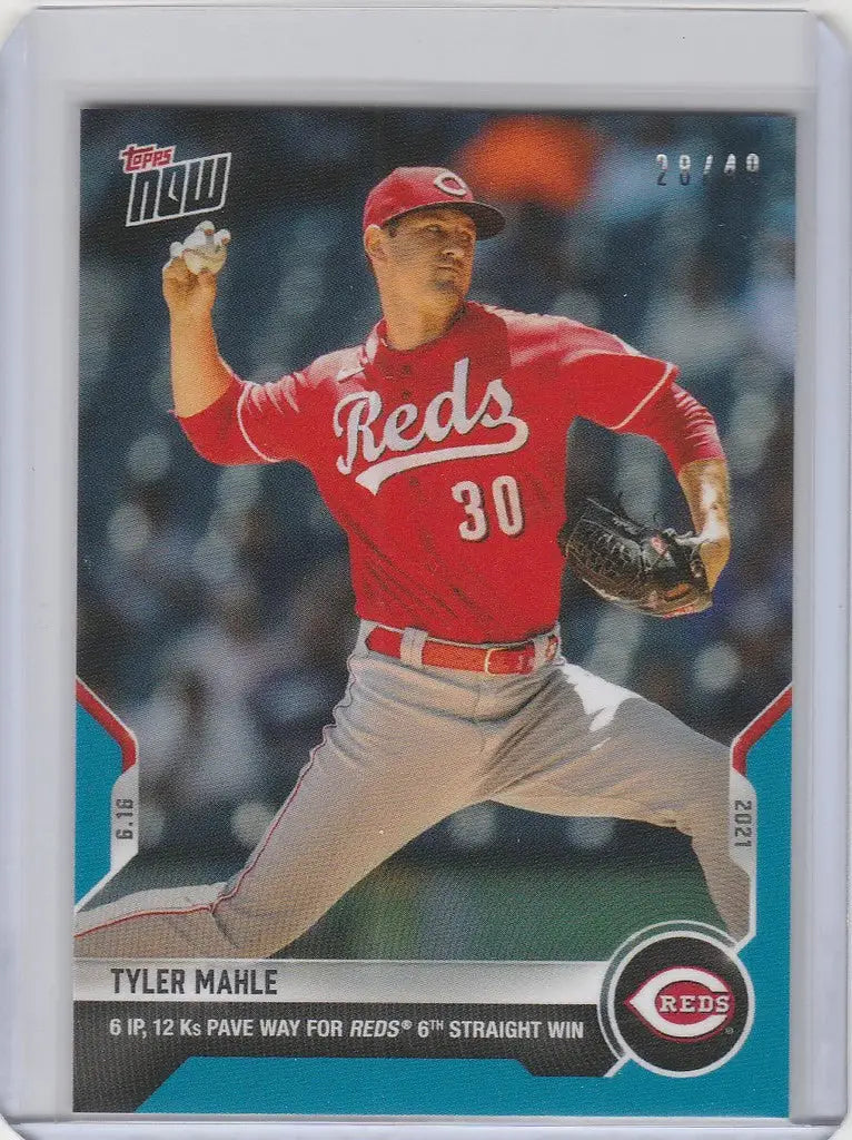 Baseball card of Tyler Mahle in mid-throwing motion for Cincinnati Reds collectors