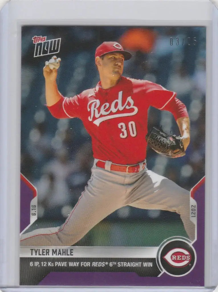 Baseball card of Tyler Mahle, Cincinnati Reds pitcher, in mid-throw action