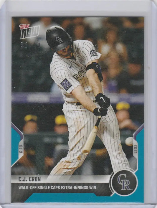 Baseball card of C.J. Cron swinging for the Colorado Rockies 31/49 collectible