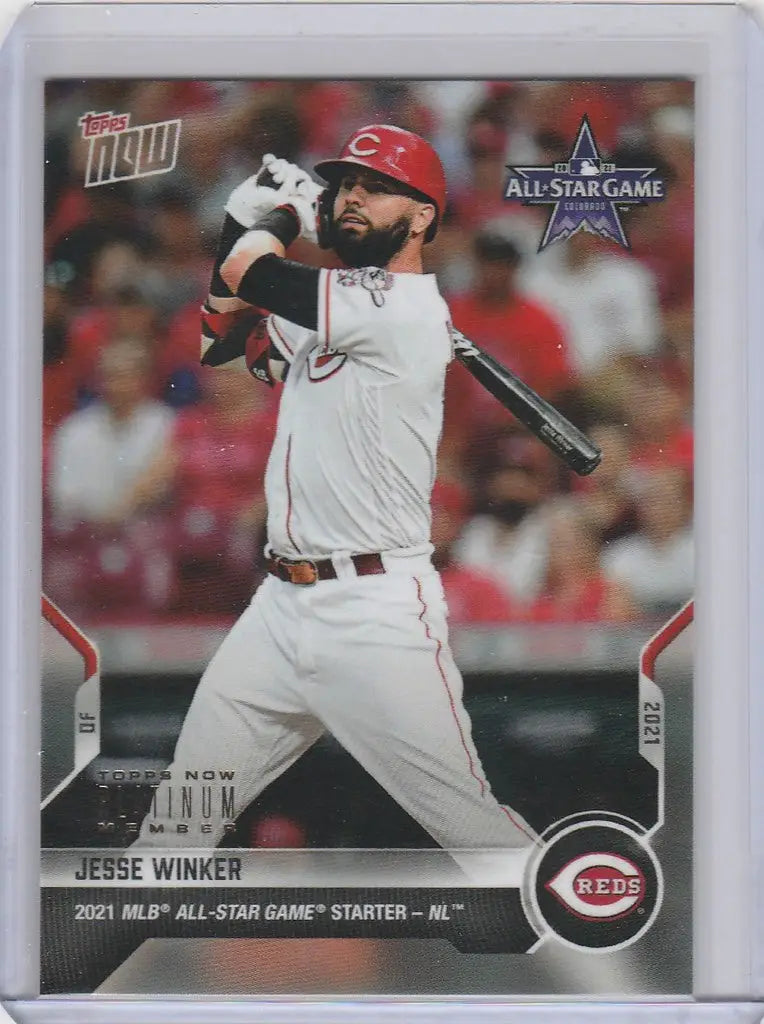 Baseball card of Jesse Winker swinging for the Cincinnati Reds in 2021 Topps Now