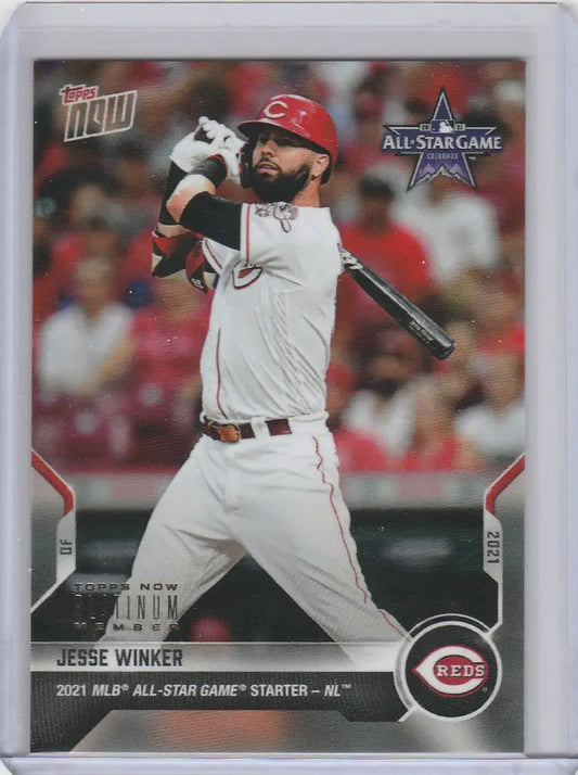 Baseball card of Jesse Winker swinging for the Cincinnati Reds in 2021 Topps Now