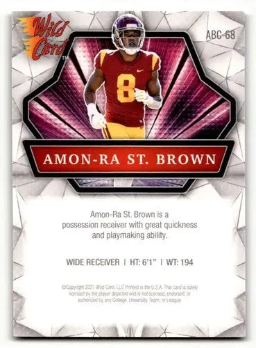 Amon-Ra St. Brown football card from 2021 Wild Card Alumination with original gloss and brown USC Trojans design