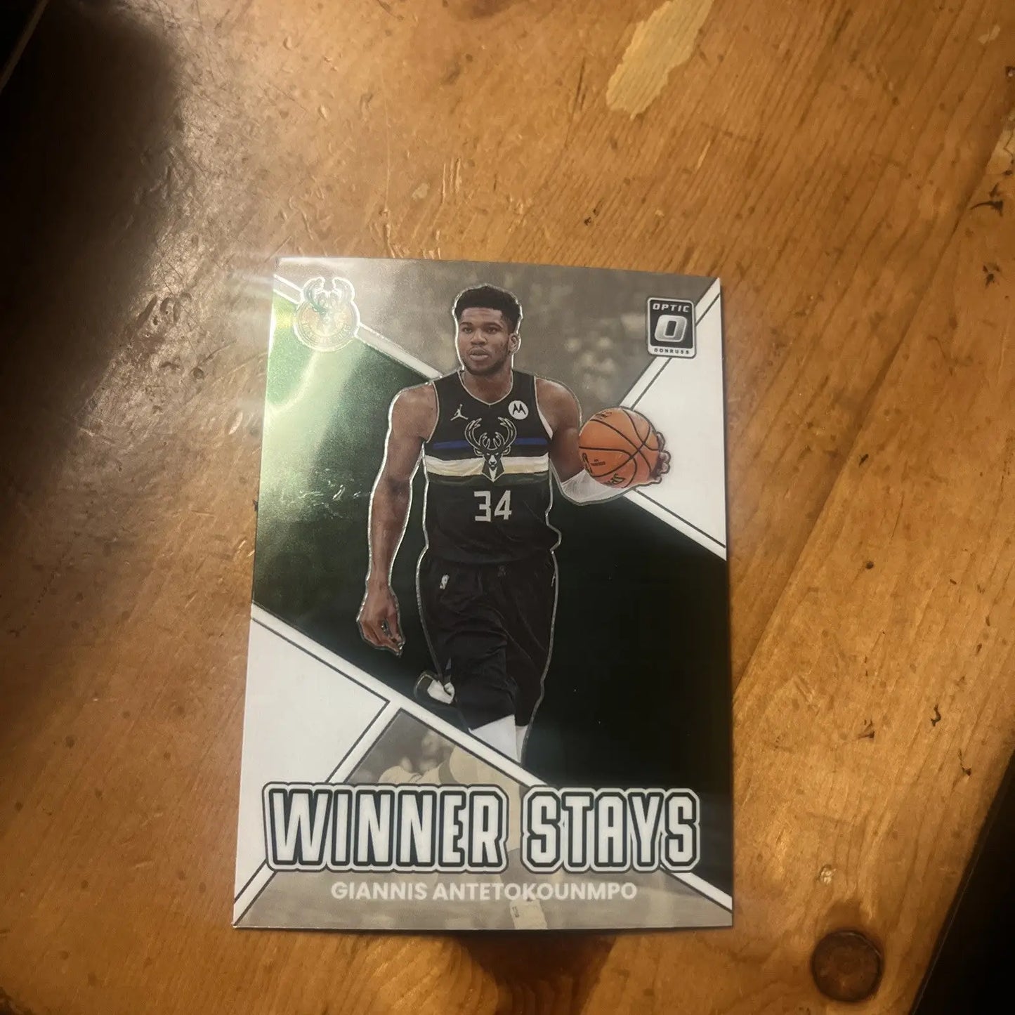 Giannis Antetokounmpo basketball card from 2022-2023 Donruss Optic Winner Stays Prizm