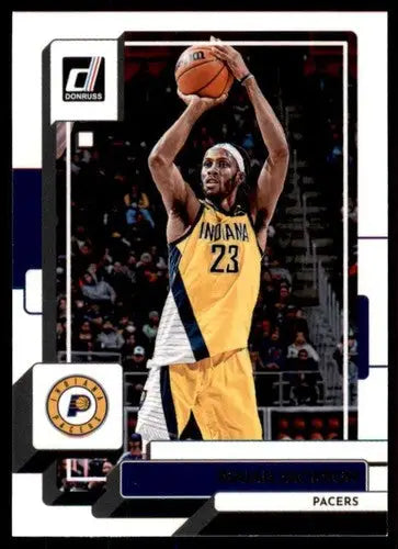 Basketball card featuring Isaiah Jackson in yellow Pacers jersey shooting, 2022-23 Donruss