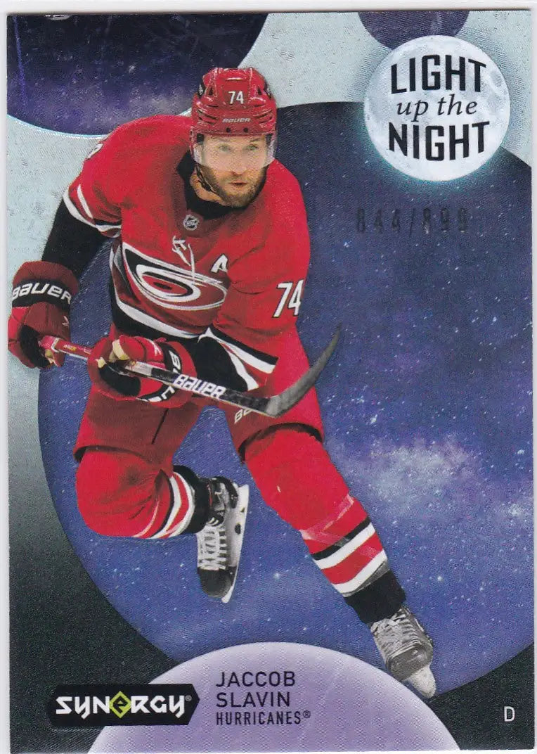 Hockey player in red Carolina Hurricanes jersey skating, Upper Deck Synergy Jaccob Slavin Light