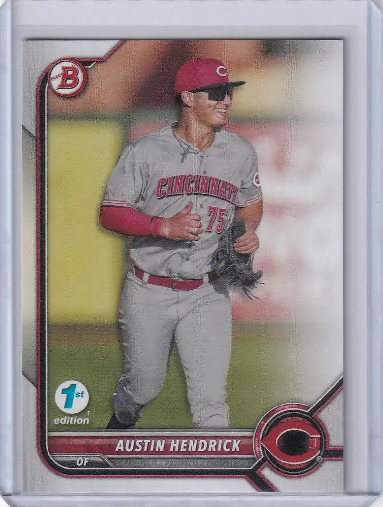 Baseball card of Austin Hendrick Cincinnati Reds in gray and red uniform from Bowman 1st Edition