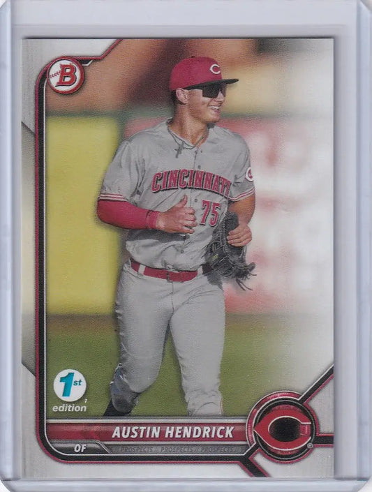 Baseball card of Austin Hendrick Cincinnati Reds in gray and red uniform from Bowman 1st Edition
