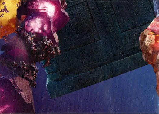 Dark geometric structure with crystalline growths from 2022 Doctor Who Puzzle Insert Card