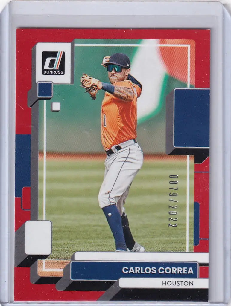 Baseball card of Carlos Correa in orange jersey for Houston Astros trading cards