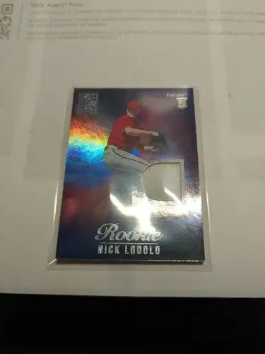 Nick Lodolo rookie baseball card with memorabilia swatch from Panini Capstone 2022
