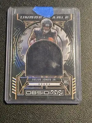 2022 Panini Obsidian V.Jones Jr. Unbreakable Material Electric Etch Orange #/75 - Football Card Single