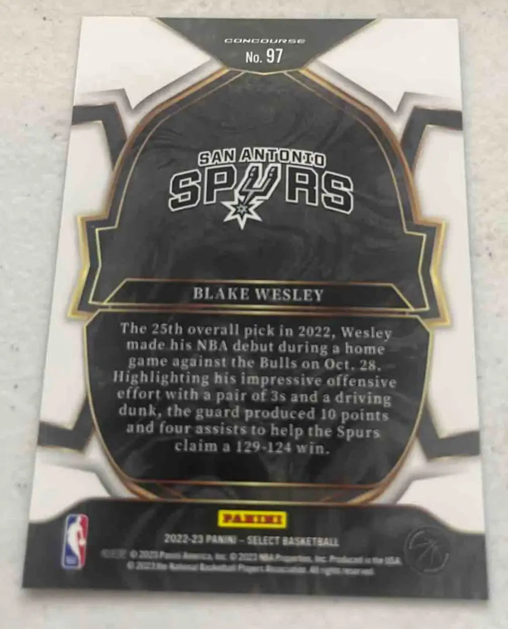 Back of a Blake Wesley San Antonio Spurs trading card from 2022 Panini Select Blake Wesley Blue Prizms #97 RC Concourse