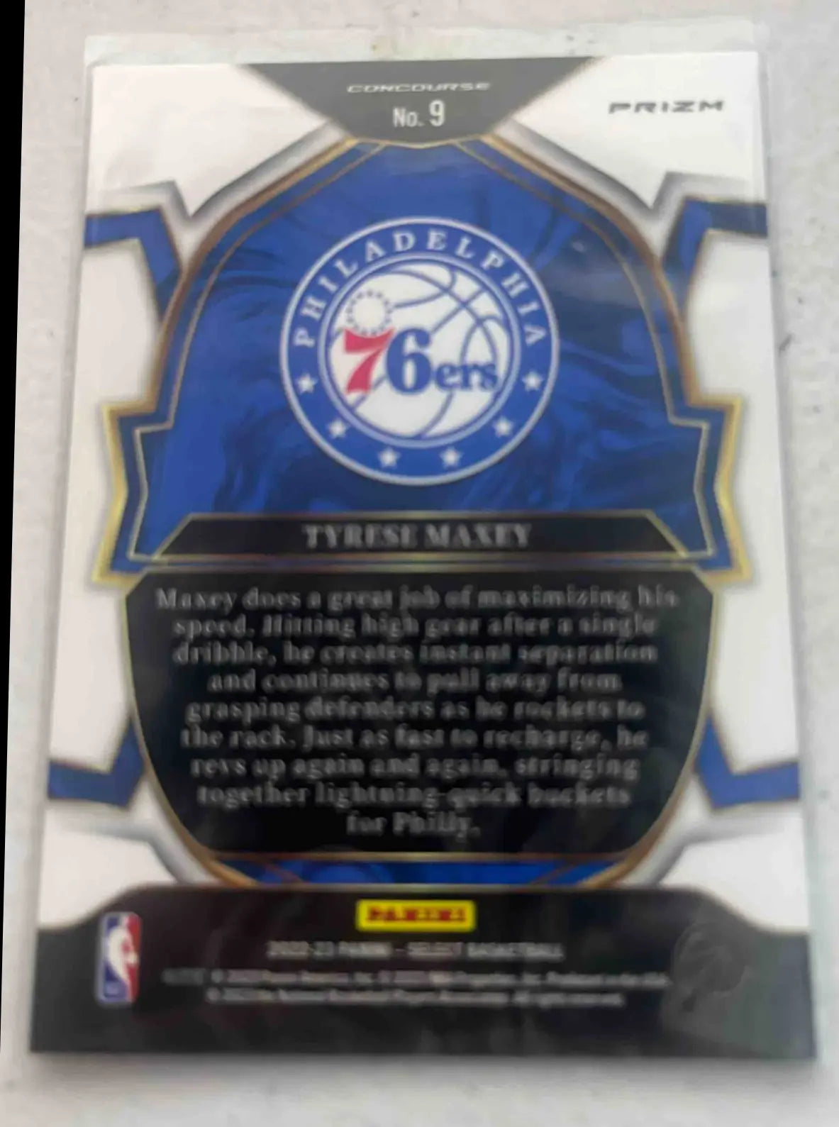 Back of 2022 Panini Select Tyrese Maxey Orange Flash Prizms #9 Concourse card