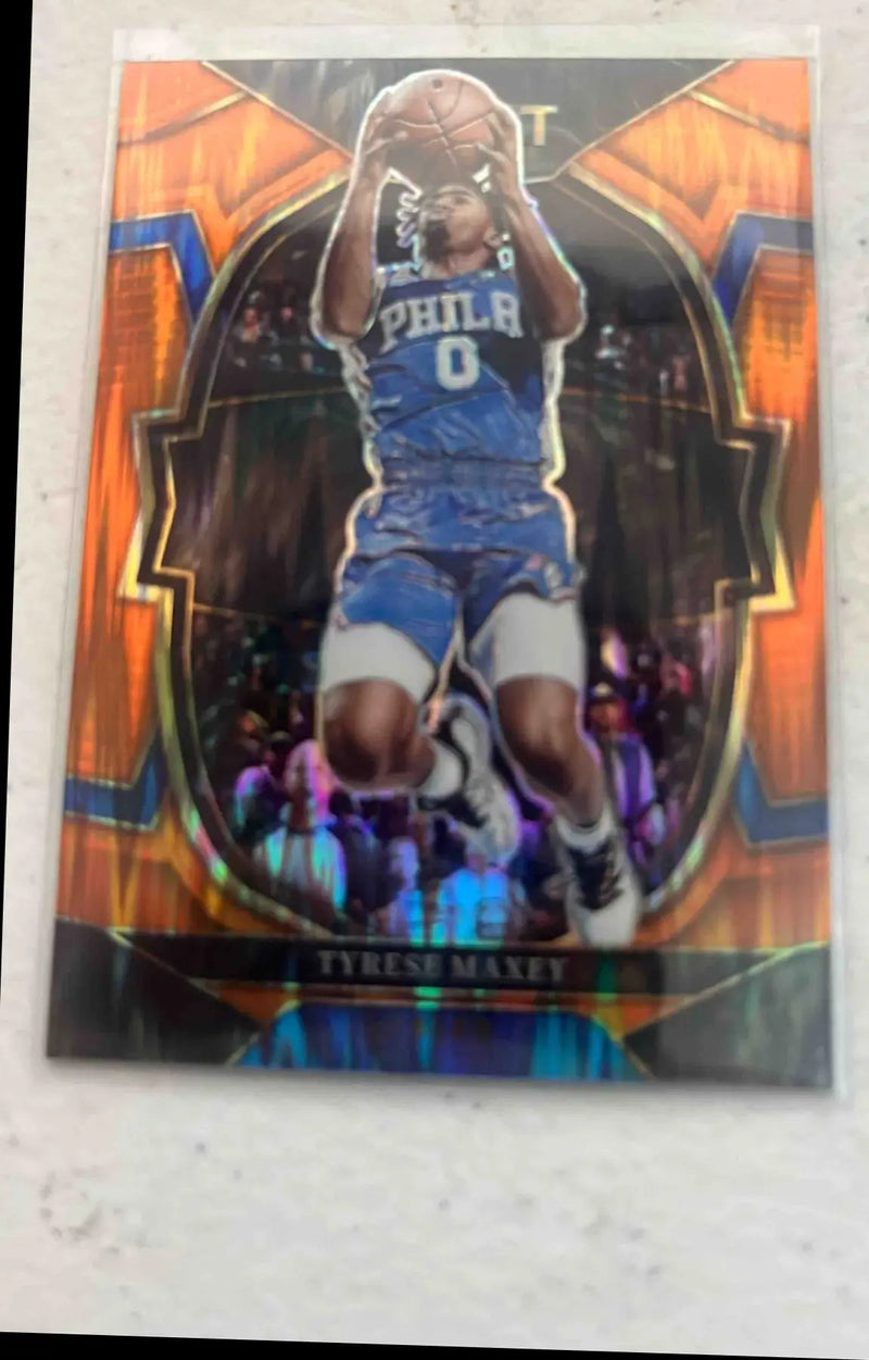 Panini Select Tyrese Maxey basketball trading card with orange border from 2022 collection