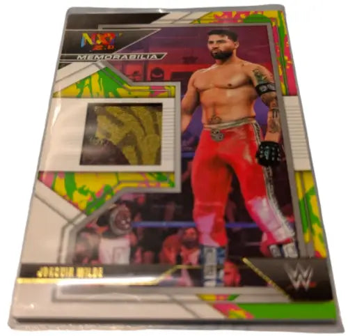 Panini WWE NXT trading card featuring male wrestler in red pants and memorabilia swatch