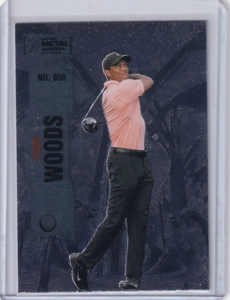 Trading card of Tiger Woods mid-swing in pink shirt, 2022 Skybox Metal design